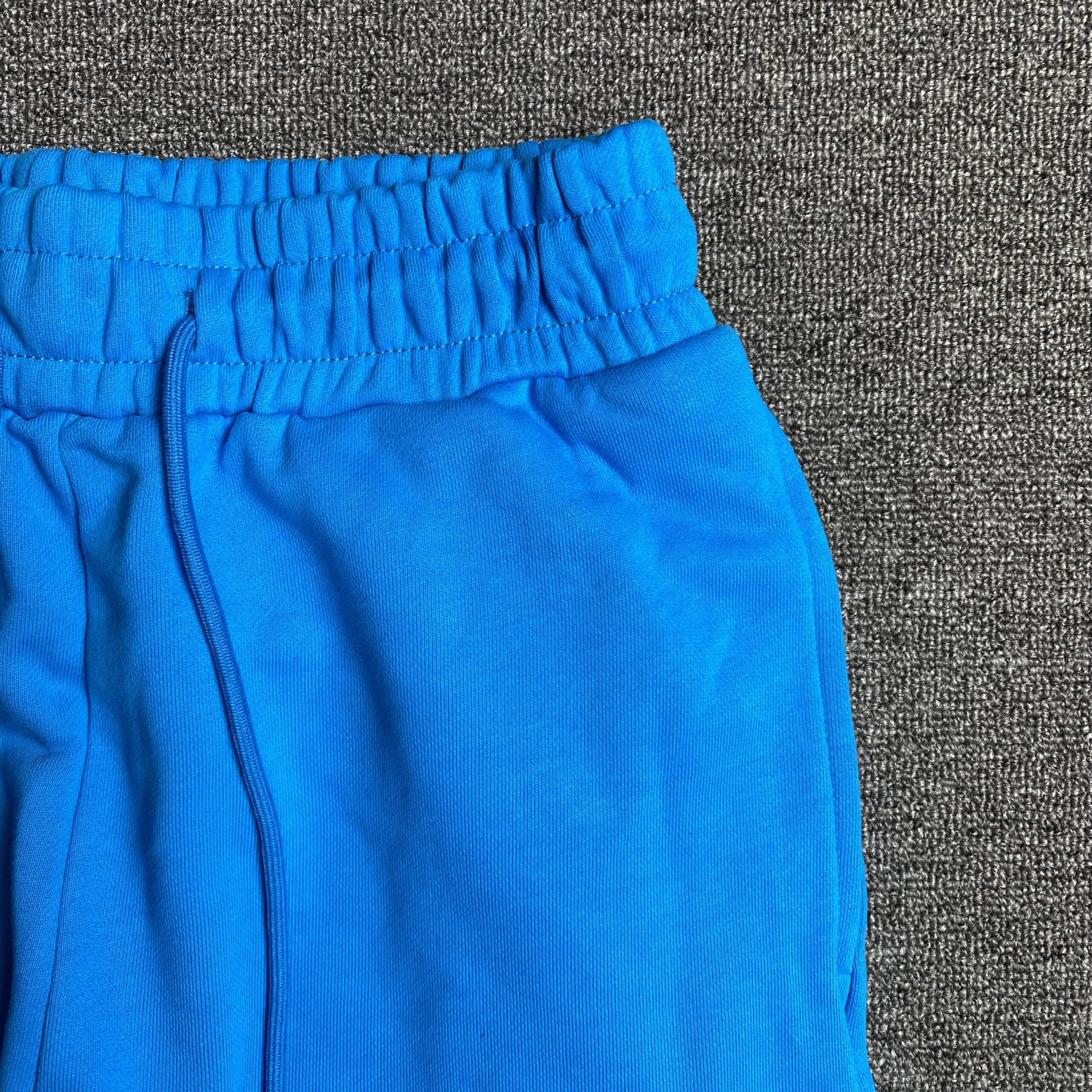DENIM TEARS COTTON WREATH SWEATPANTS AZURE BLUE