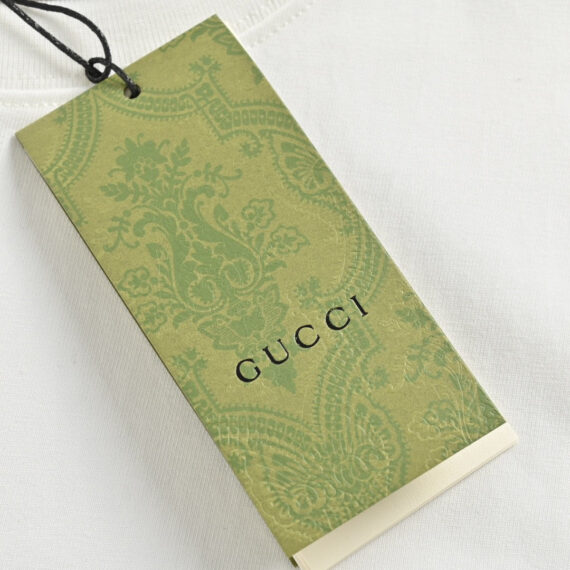 Gucci White T-Shirt with Pink Dinosaur Graphic